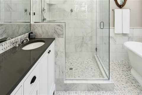 Do you install a bath before or after tiling?