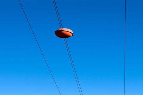 This Is Why You See Colored Balls on Power Lines