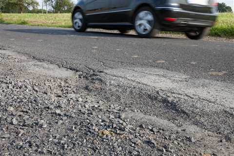 Save Money and Learn How to Repair Potholes in Your Asphalt Driveway