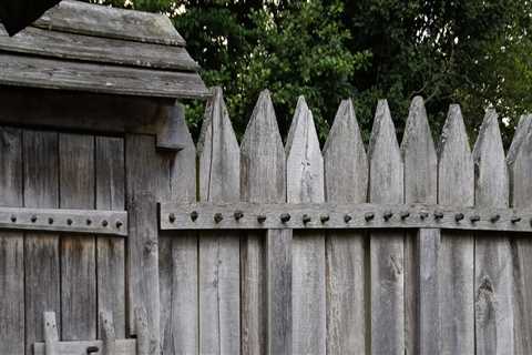 Is a fence defined as a structure?