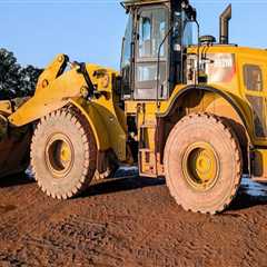 Building With Nature: The Synergy Of Skid Loader Tree Pullers And Natural Stone Materials