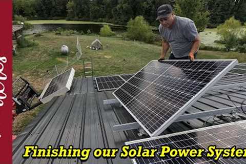 Installing the rest of our solar panels.  Finishing up the installation of our solar power system.