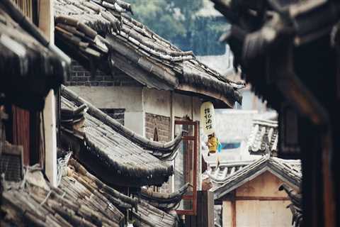 Why Attic Fans Matter for Your Home and How Quality Roofing in Lansing, MI Protects Your Investment