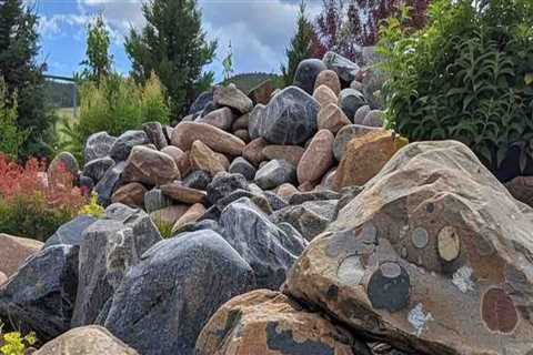 Enhancing Your Landscape Renovation with Natural Elements: Rocks and Boulders