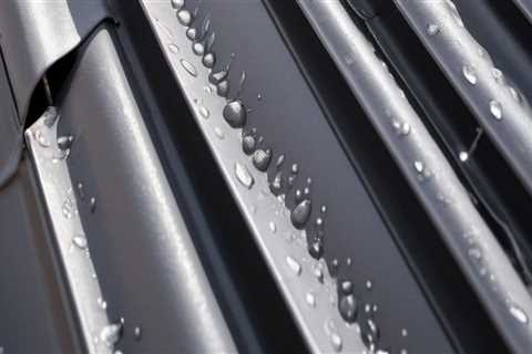 How Roofing Services Address Condensation Risks in Metal Roofing Projects